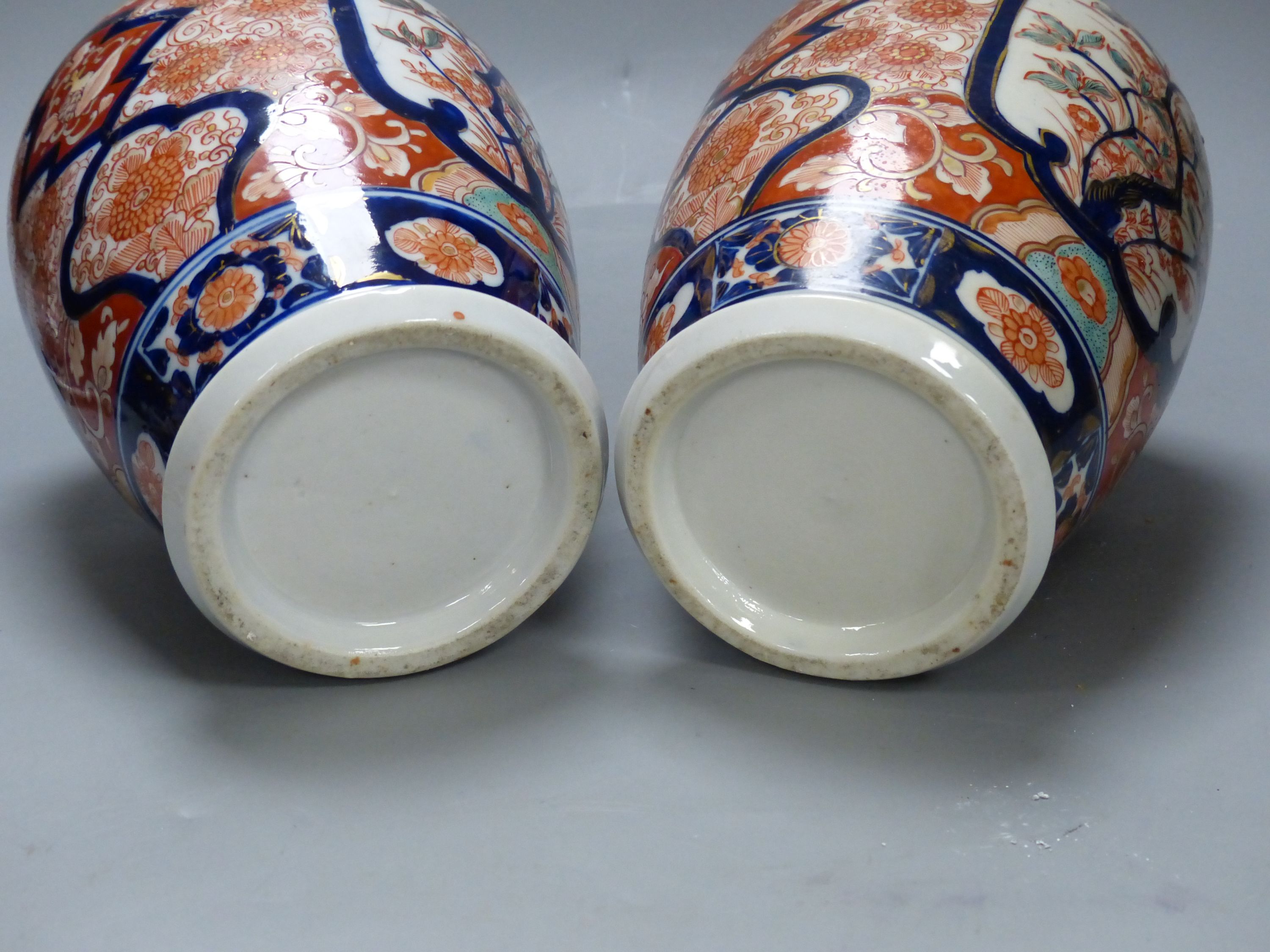 A pair of Imari vases and covers and a Limoges box, height 30cm
